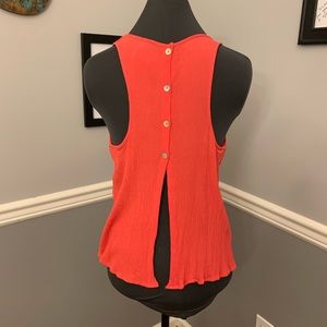 Open back coral top with shell buttons